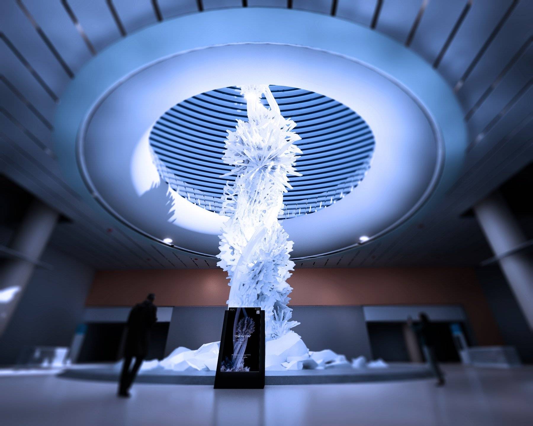 Visualisation of the 32-metre Call for Life sculpture rising through the oculus of the terminal, with an information kiosk at its base